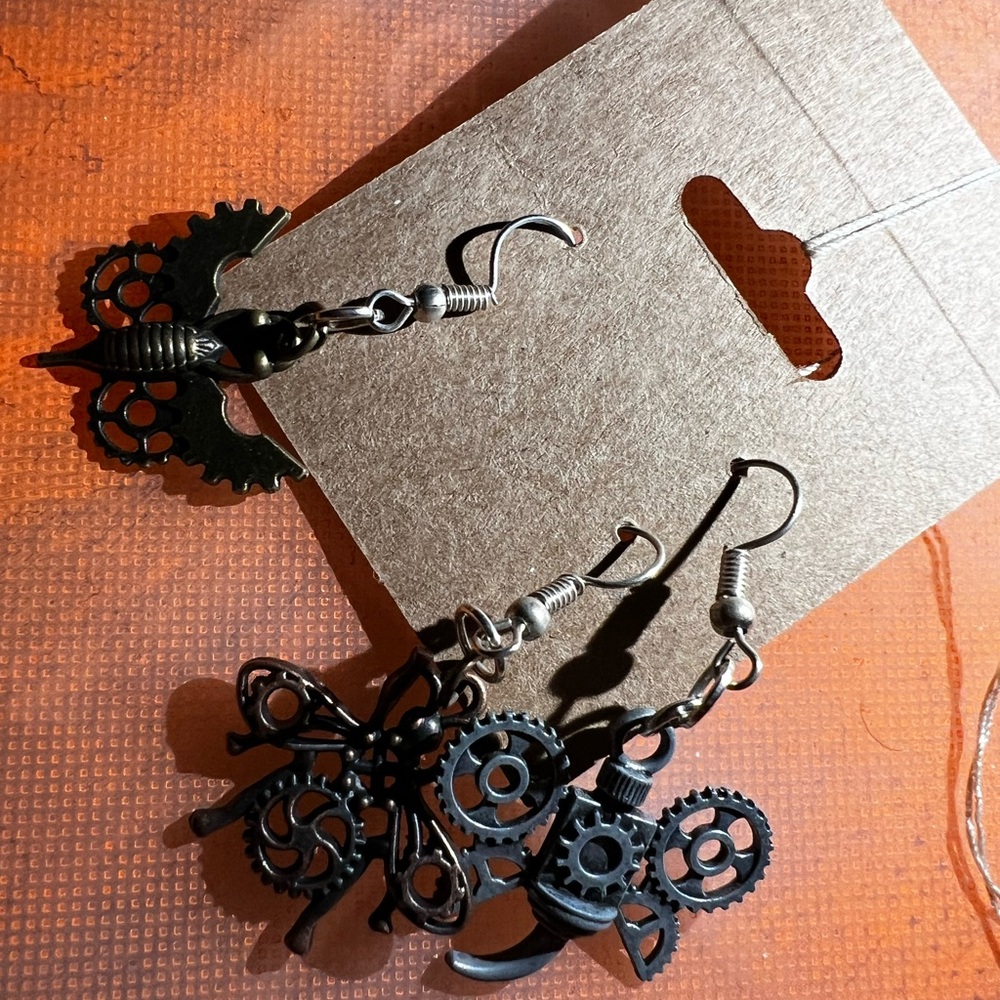 Three mismatch bug earrings